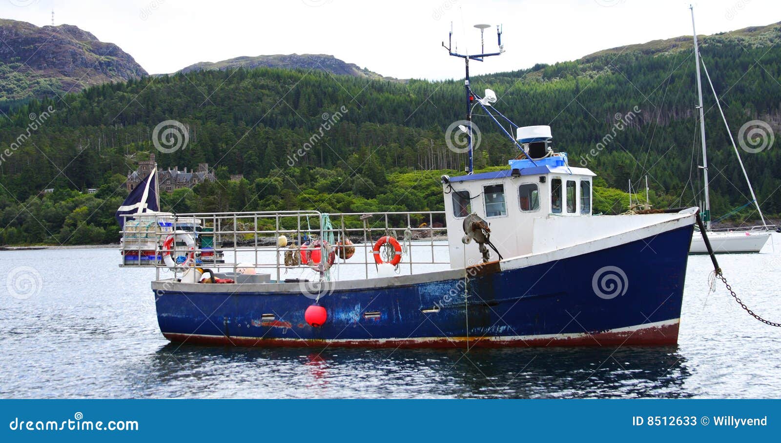 Old fishing boat in the bay of plockton upon loch carron, Scotland.