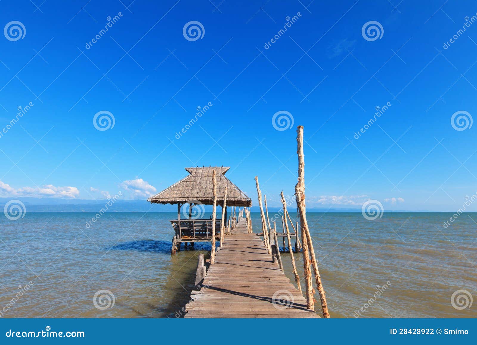 Old Wooden Boat Dock, Going Far Out To Sea. Stock Photography - Image 