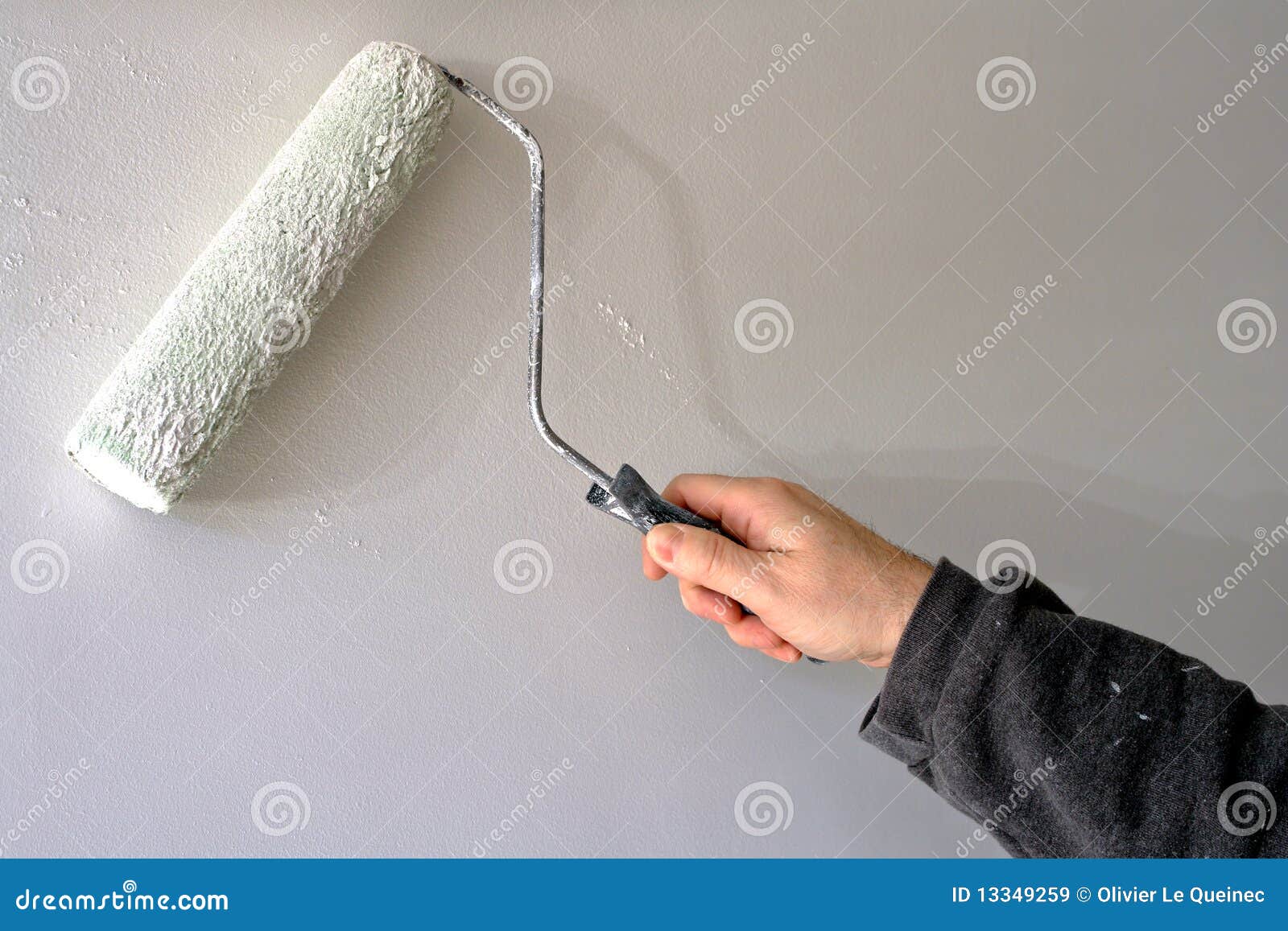 Painter Painting A House Wall With A Paint Roller Royalty Free ...