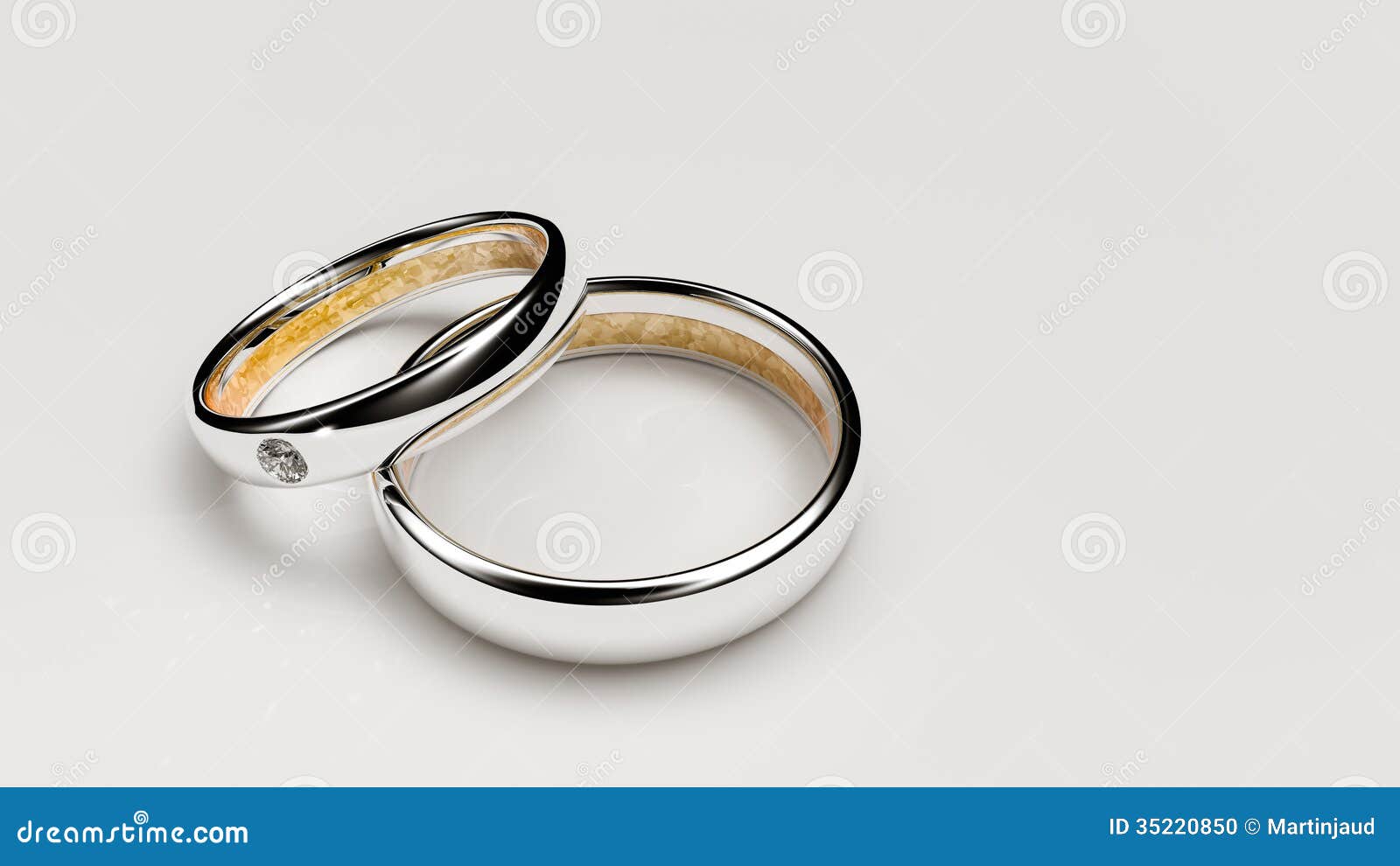 Pair of lovers wedding rings with a small diamond.