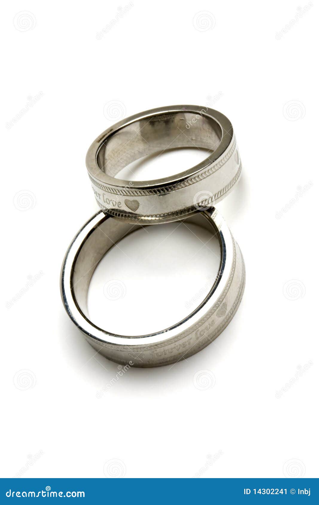 Pair of wedding rings isolated on white.