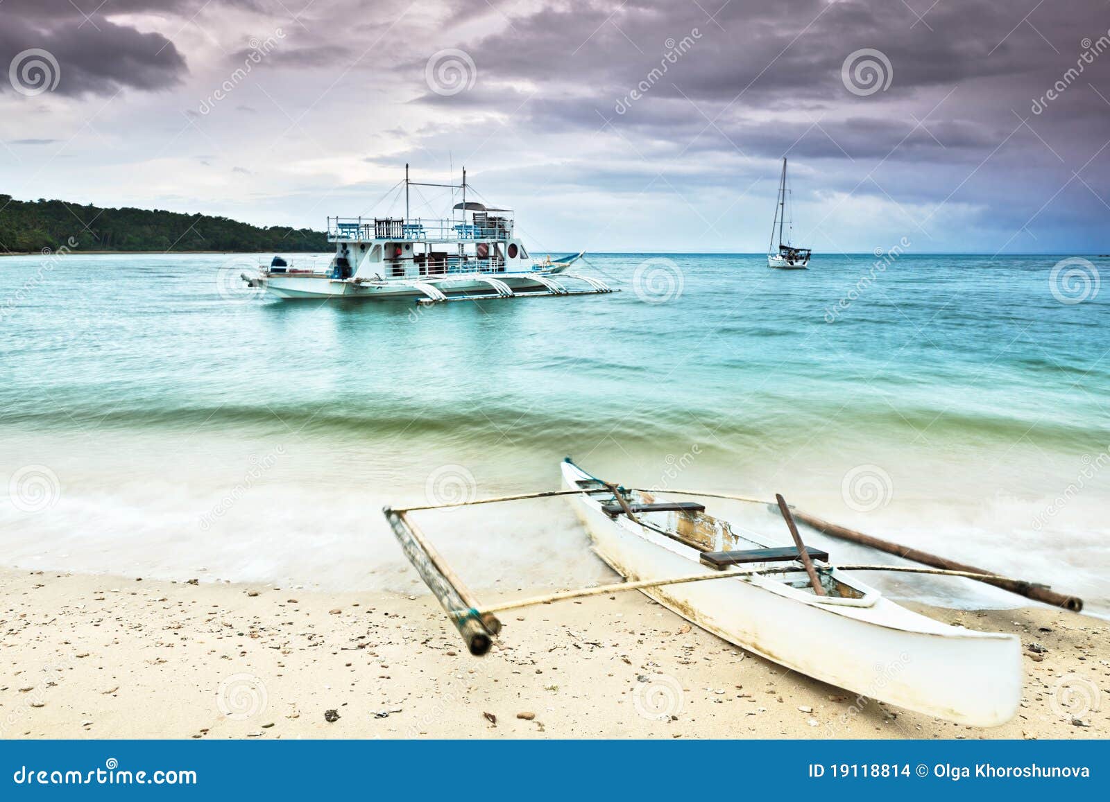 Traditional Philippine boat in the tropical lagoon.