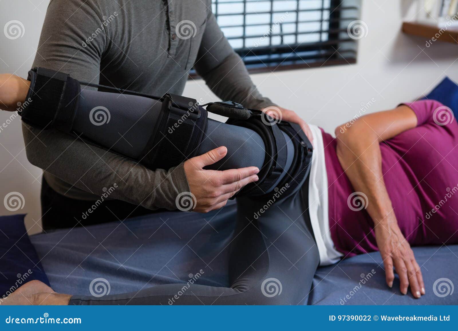 Physiotherapist Examining His Patients Knee Stock Photo Image Of