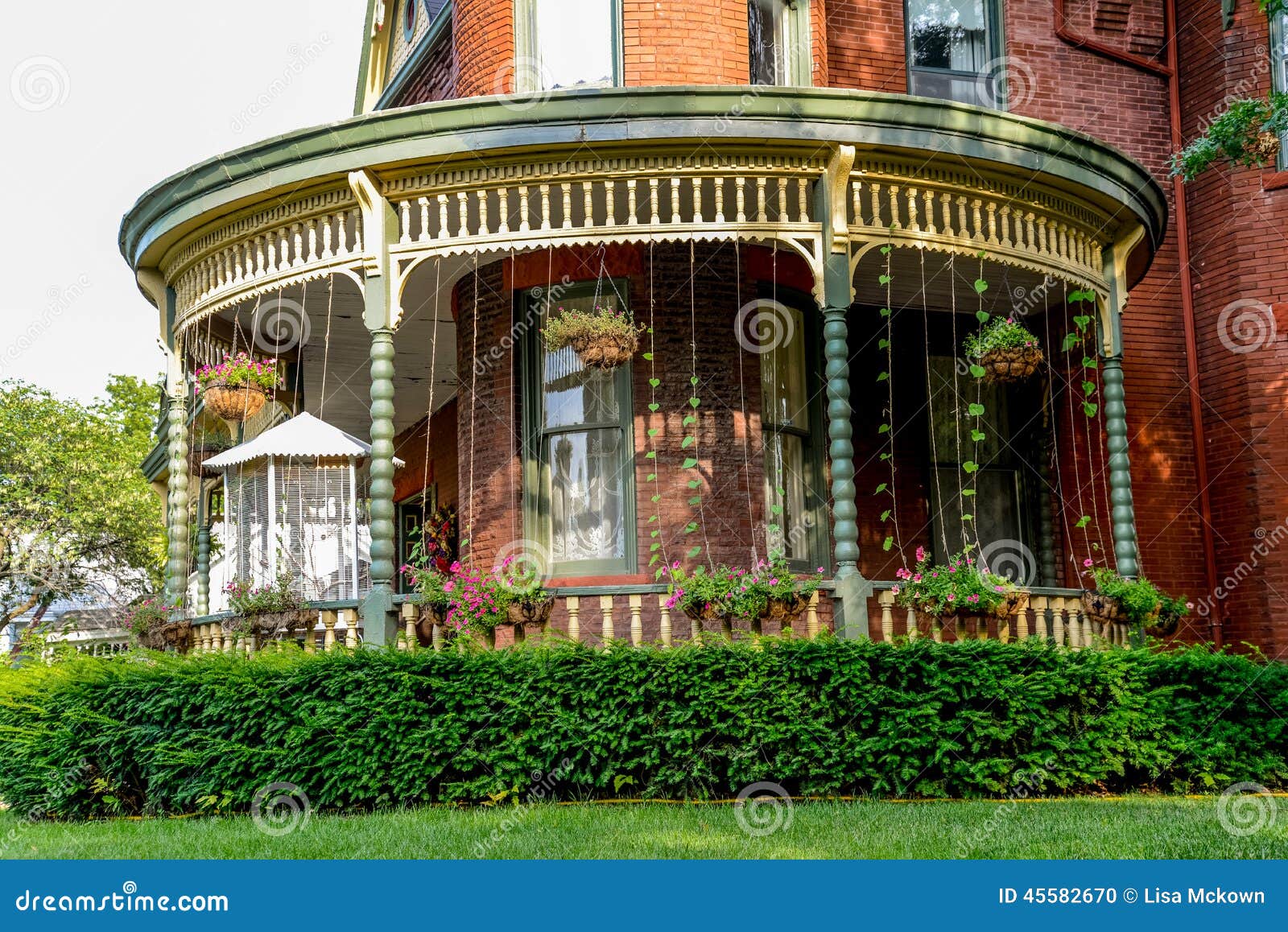 porch victorian brick bed breakfast home queen anne archictecture beautiful landscaping lexington missouri 45582670