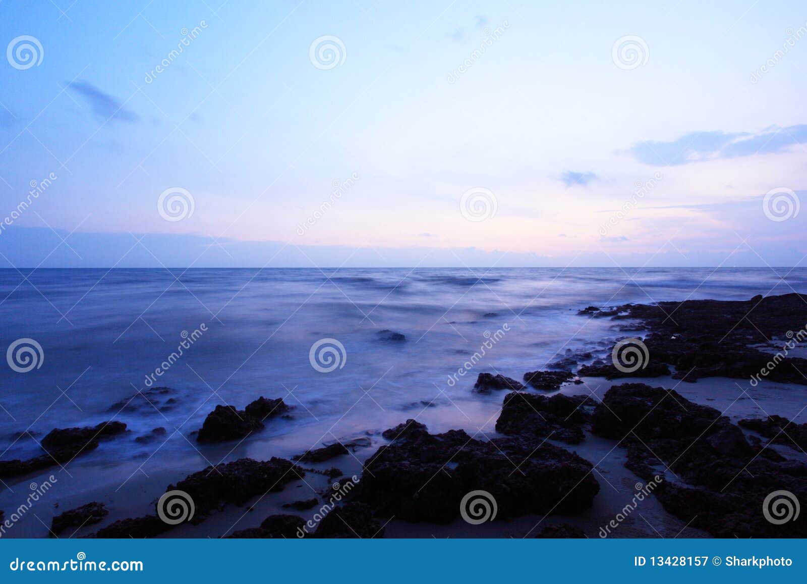 Sunset at Port Dickson beach in Negeri Sembilan, Malaysia.