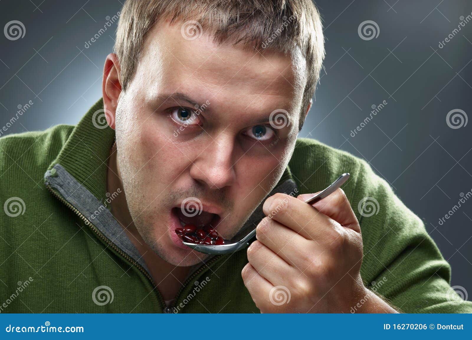 portrait-hungry-man-eating-beans-16270206.jpg