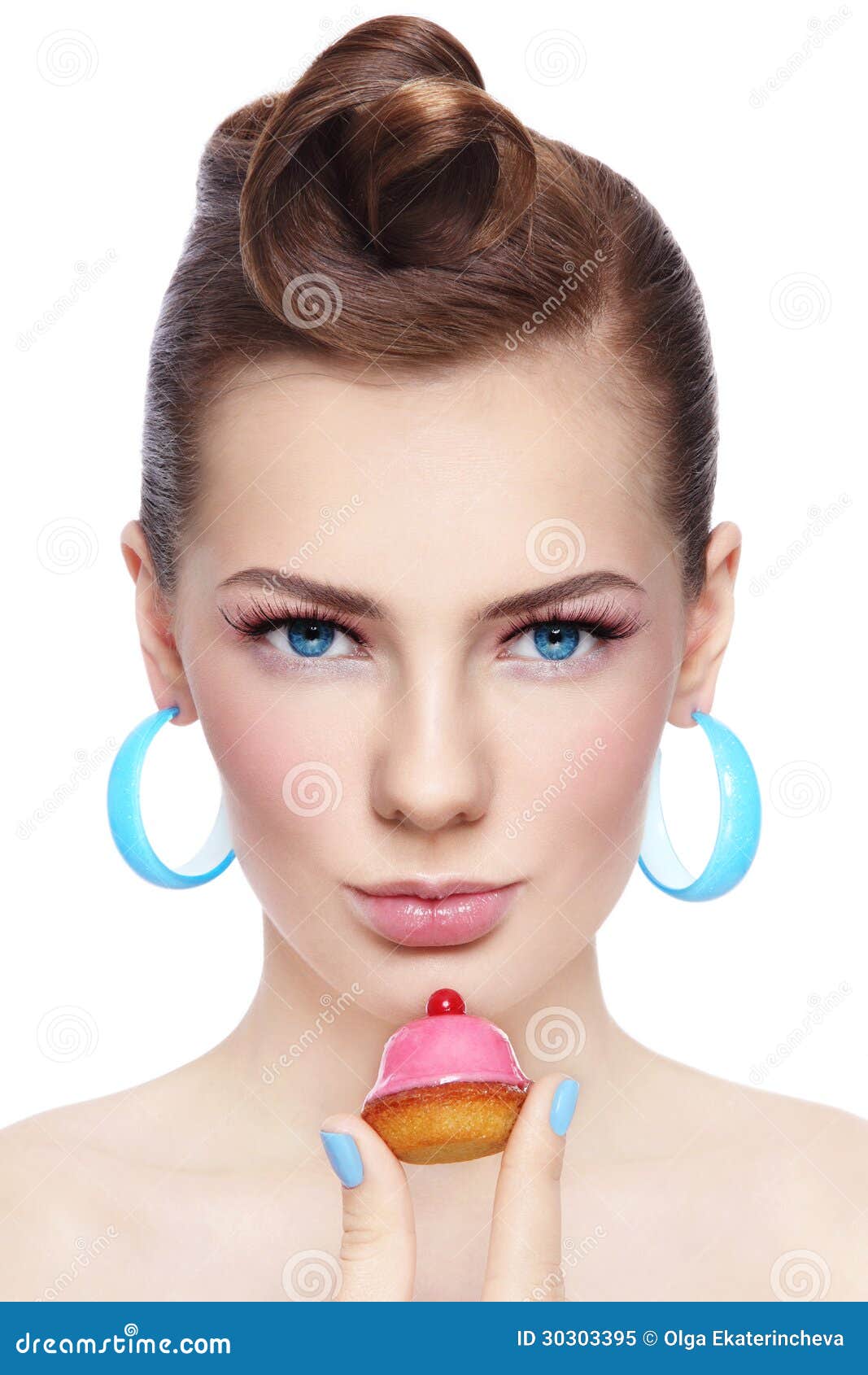 Portrait Of Young Beautiful Woman With Petit Four Pastry In Her Hand