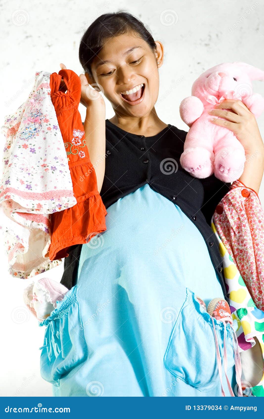 Pregnancy And Baby Clothing Shopping Stock Images - Image: 13379034