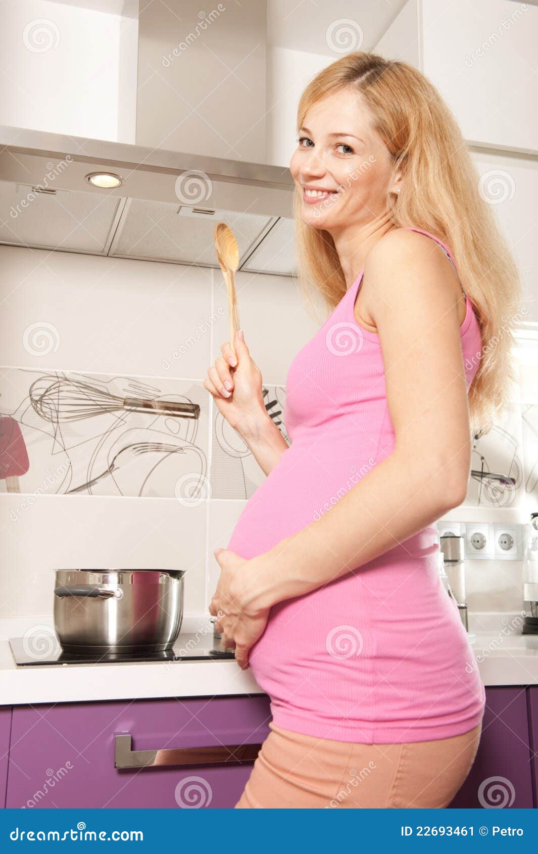 Pregnant Cooking Stock Image - Image: 22693461