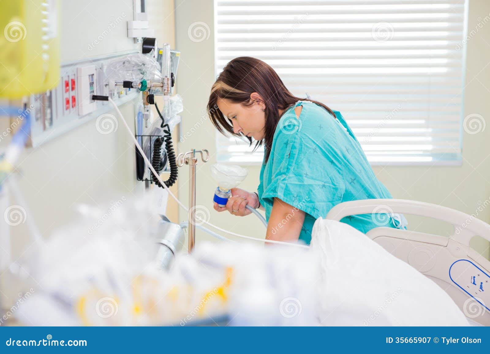 Nitrous+Oxide+Mask ... Free Stock Photography: Pregnant Woman Holding Nitrous Oxide Mask In