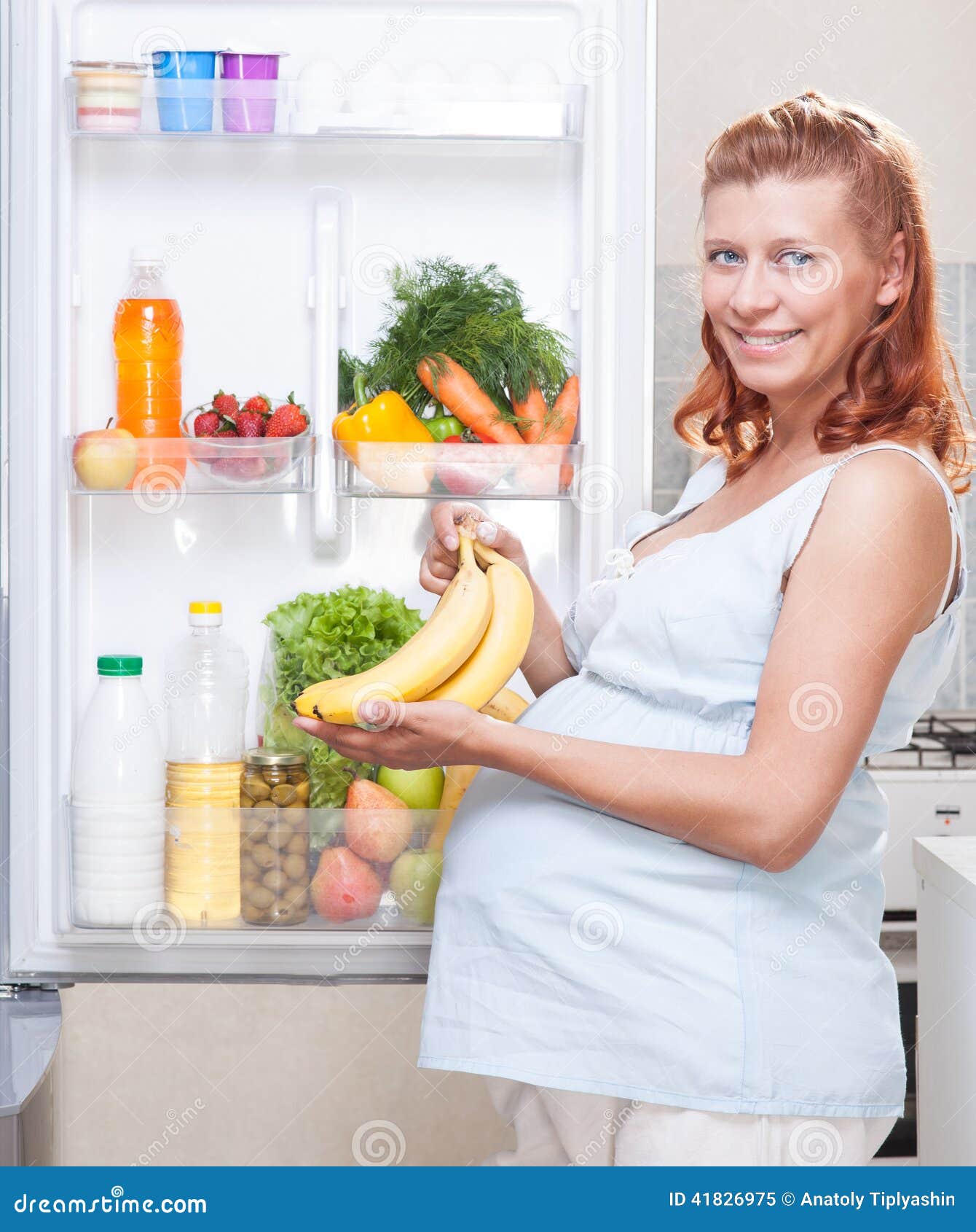 Pregnant Woman And Refrigerator With Health Food ...