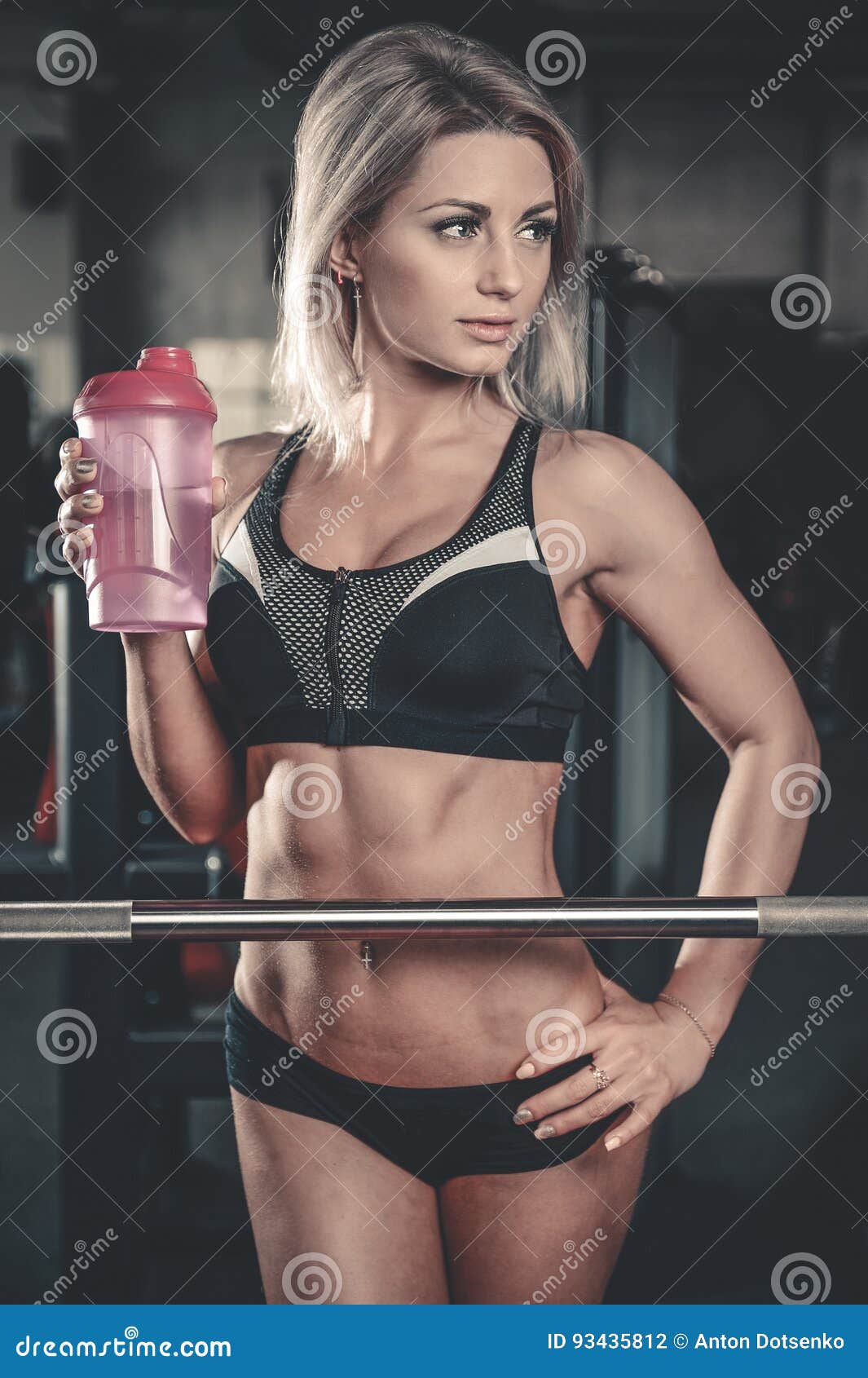 Pretty Caucasian Fitness Girl Drinking Protein Powder From Shake Stock