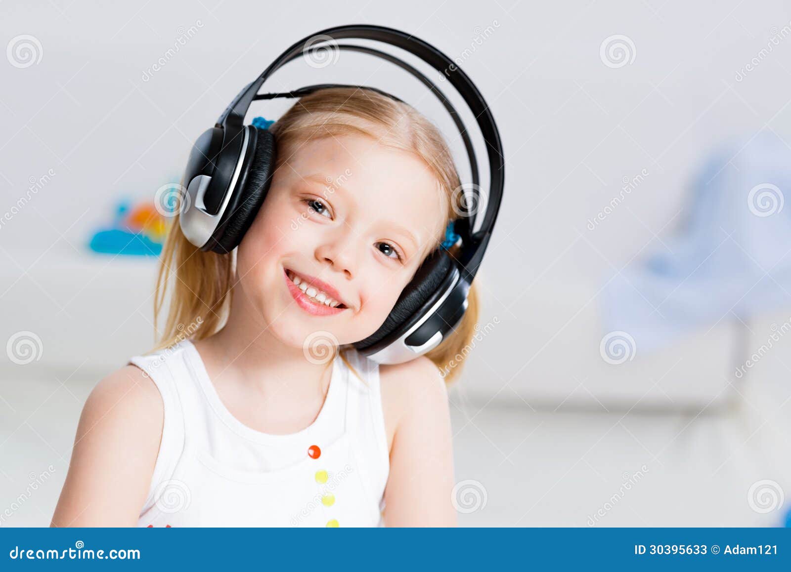 Girl Listening To Music In Living Room Girl Listening To Music In Living Room