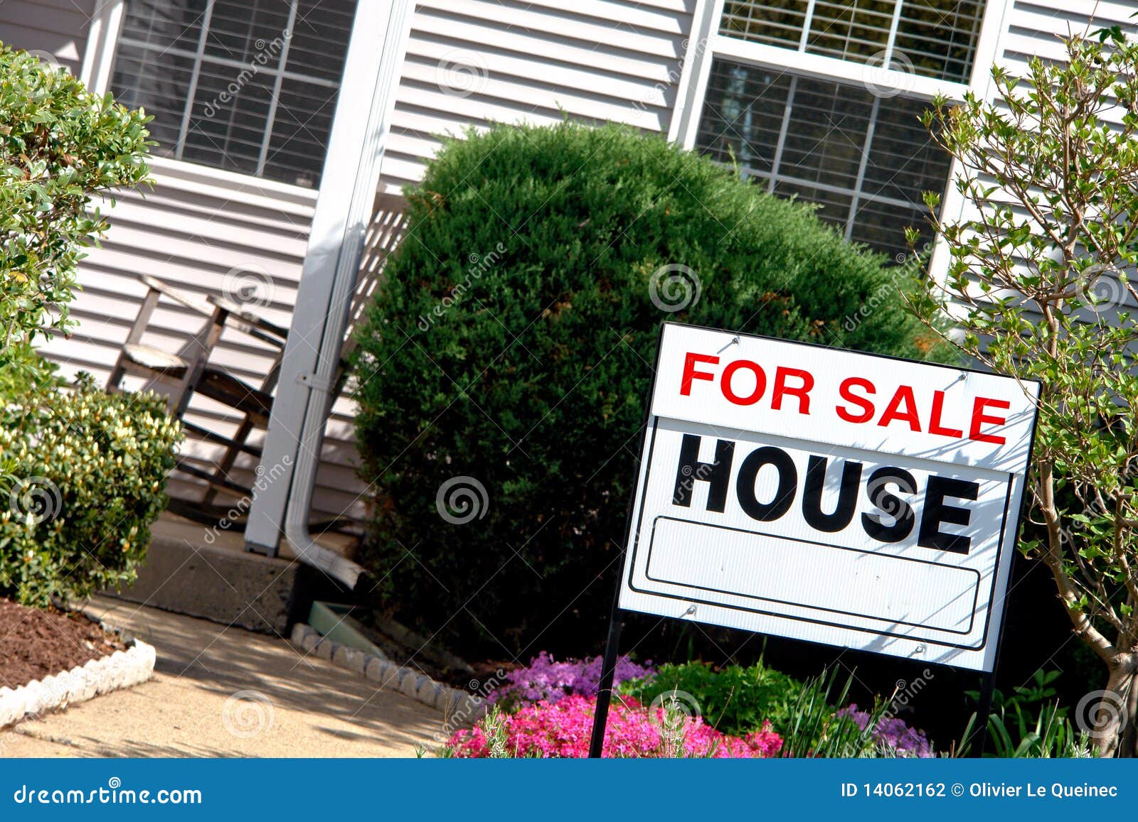 Stock Photography: Real Estate Realtor For Sale Sign in House Garden