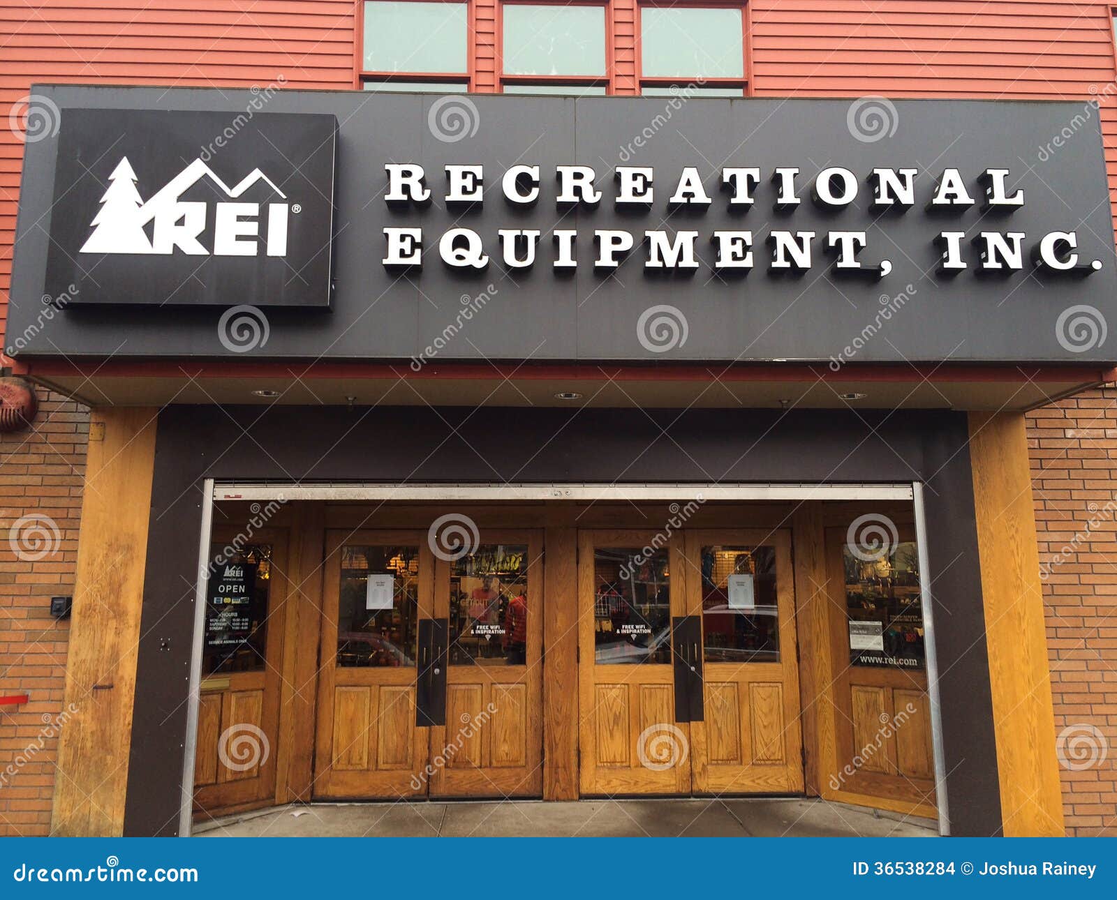 2014: REI Recreational Equipment, Inc. store entrance and sign. REI ...