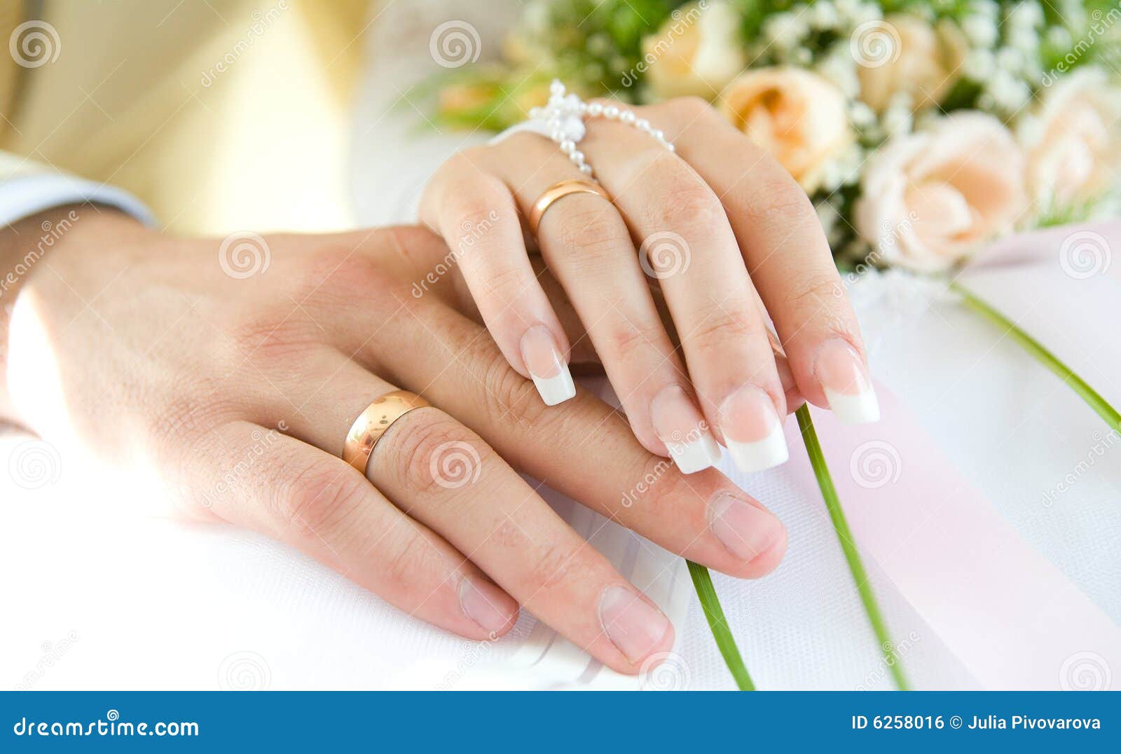 hands with wedding rings