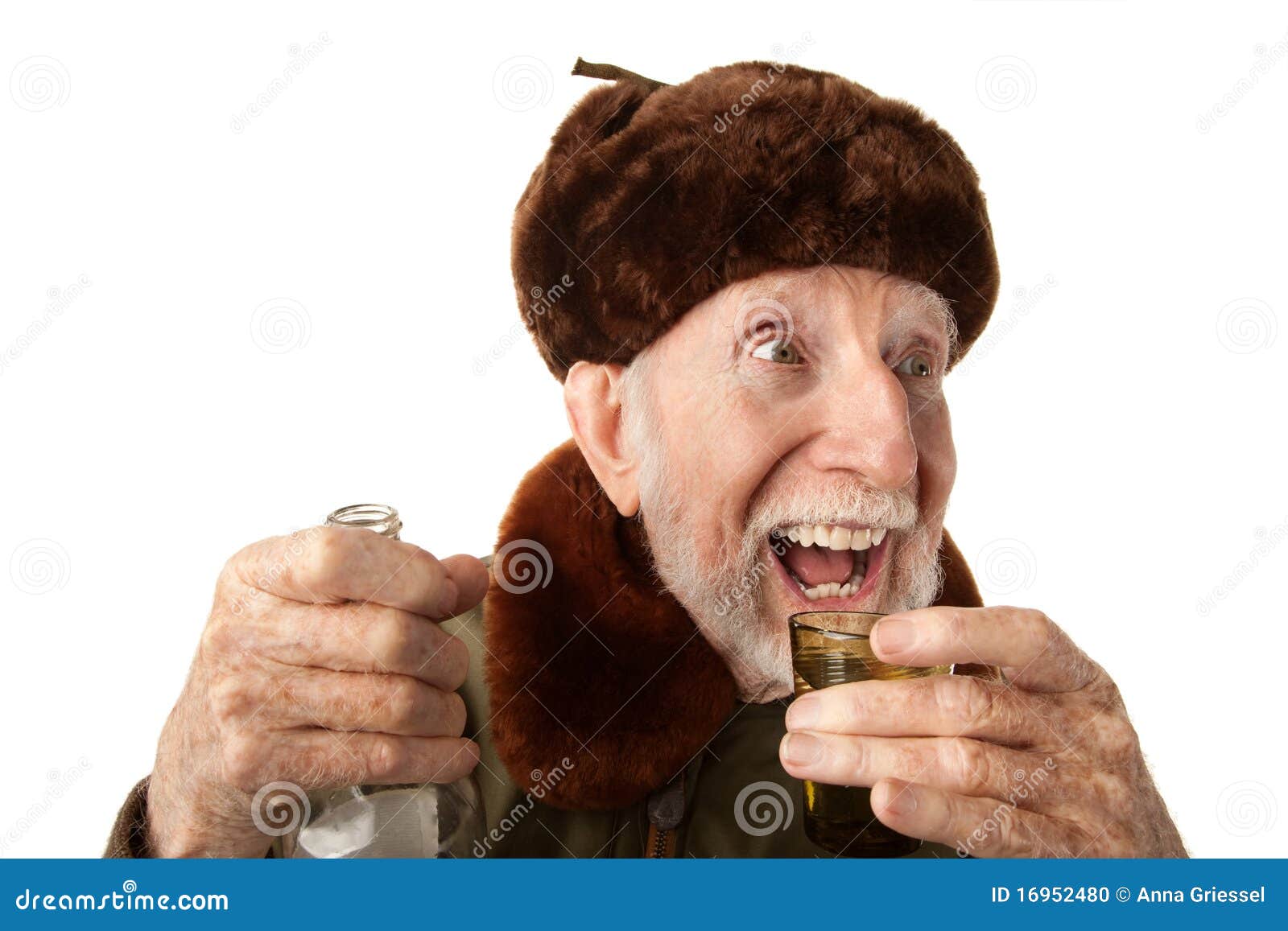 Russian Man in Fur Cap with Vodka Stock Photo - russian-man-fur-cap-vodka-16952480