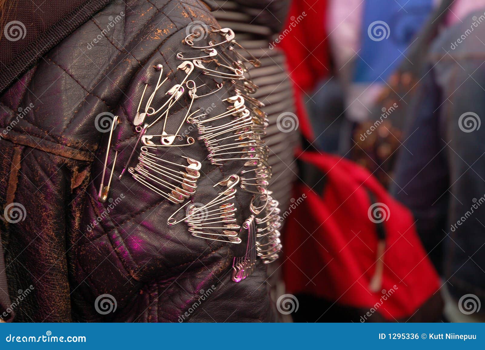 Safety Pins On Leather Jacket Royalty Free Stock Image