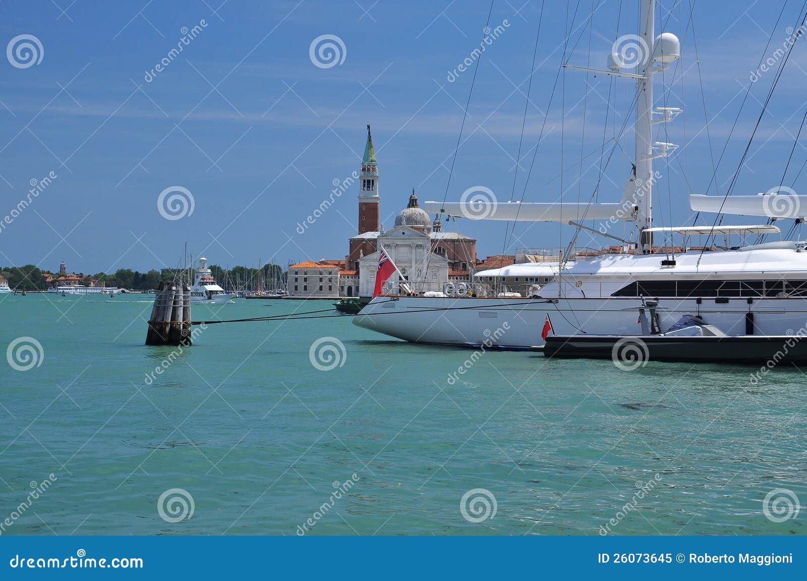 Sail boat in front of the San Giorgio church, Giudecca canal, Venice 