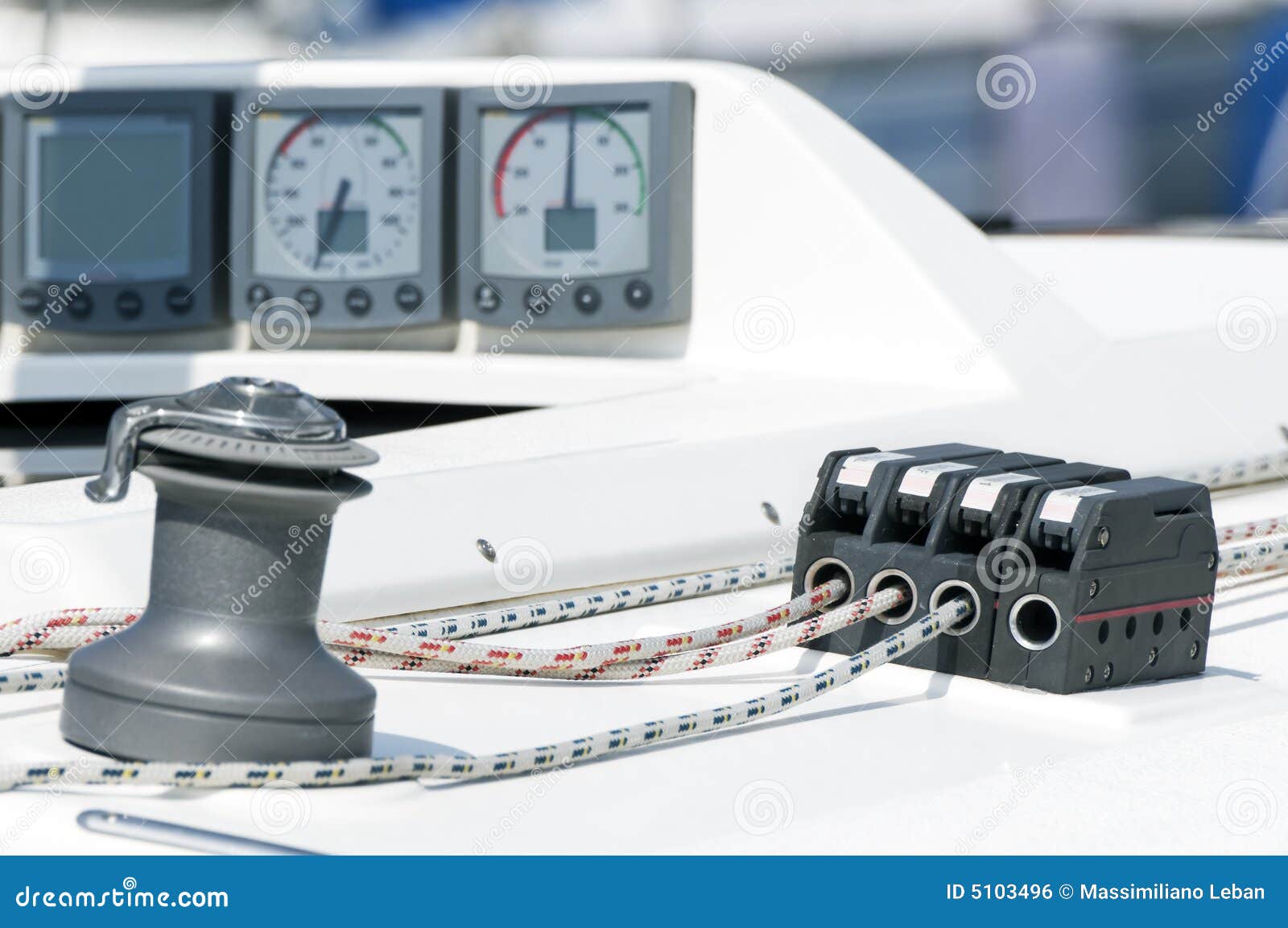Close-up of a boat with navigation instruments, winch and rope stopper 