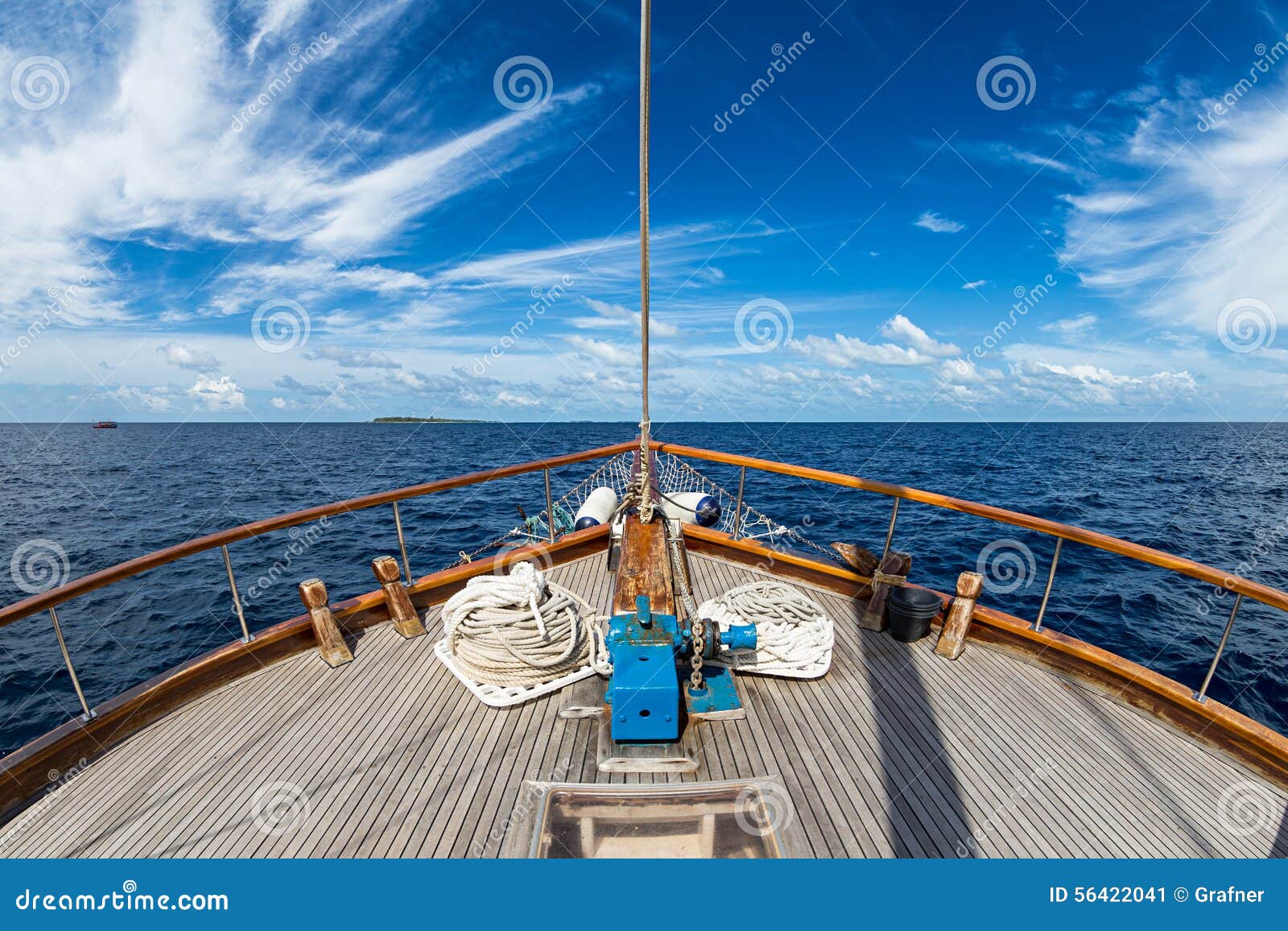 Sailing boat on the wide open ocean.