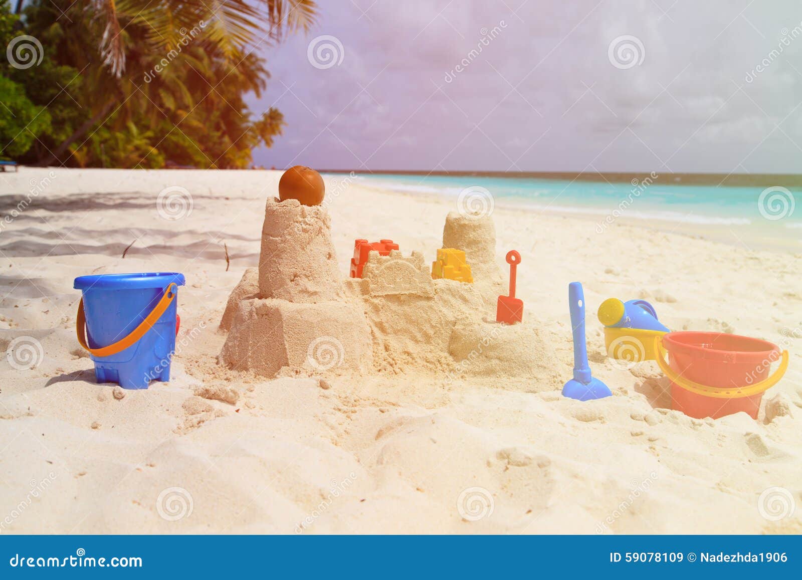 Sand Castle On Beach And Kids Toys Stock Photo - Image ...