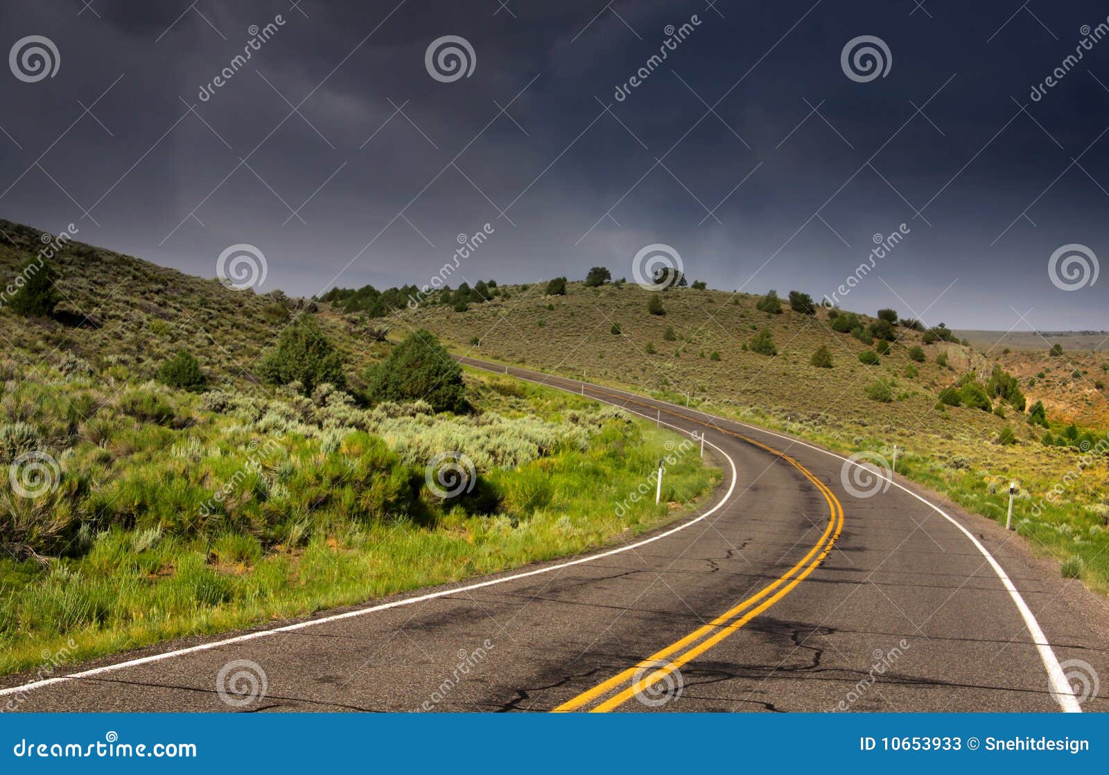 Scenic drive with cloudy sky background in Utah.