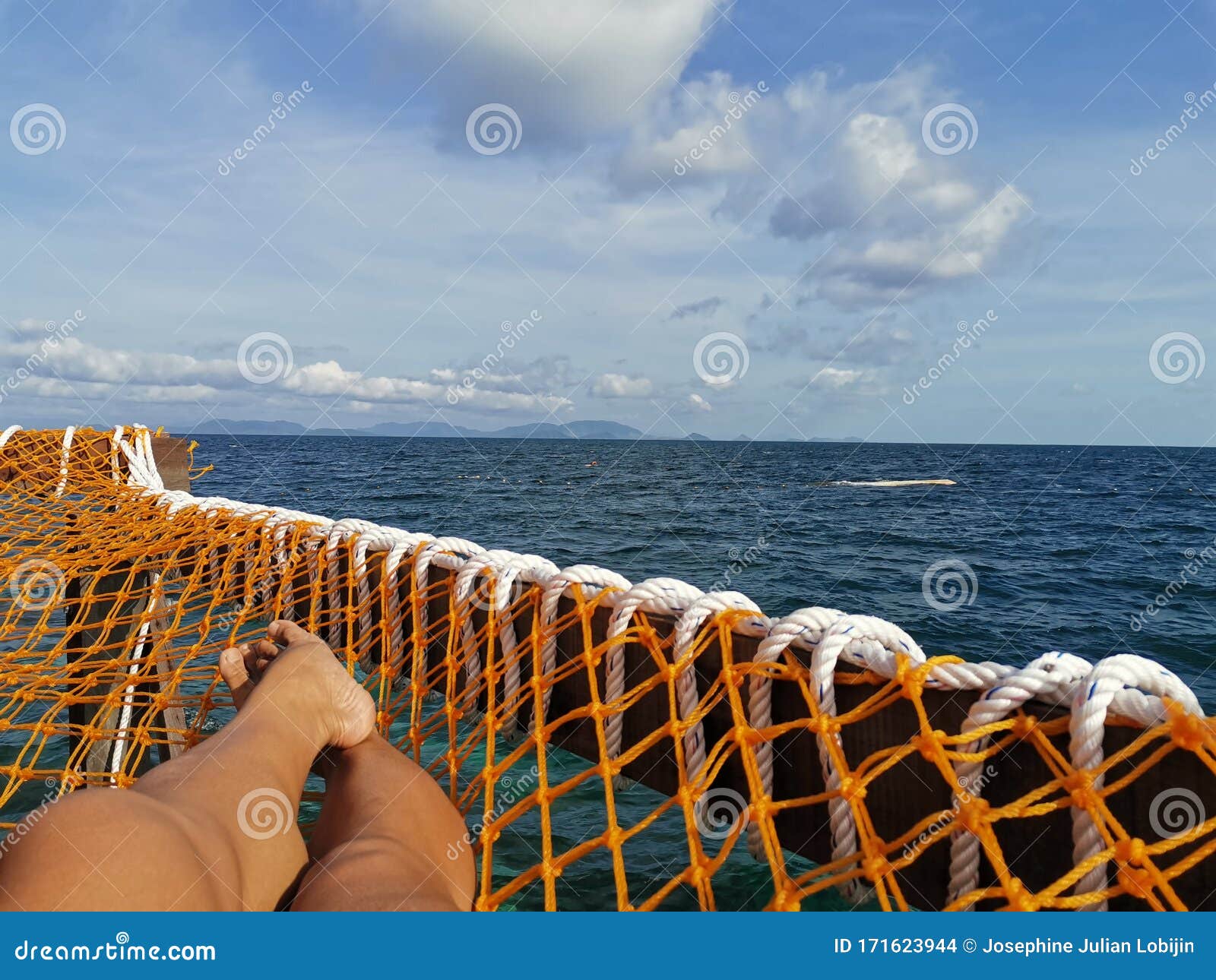 Lady Relaxing On The Laying Net Tanning In Mabul Island 70950 Hot Sex Picture photo photo