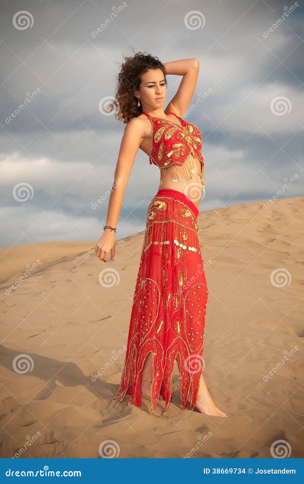 Sexy Woman Belly Dancer Arabian In Desert Dunes Stock