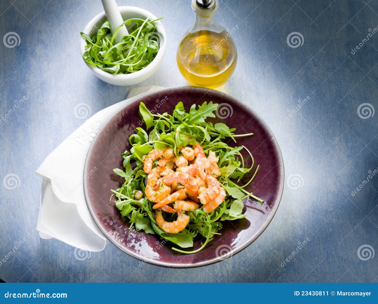 Shrimp salad with arugula olive oil and balsamic vinegar.