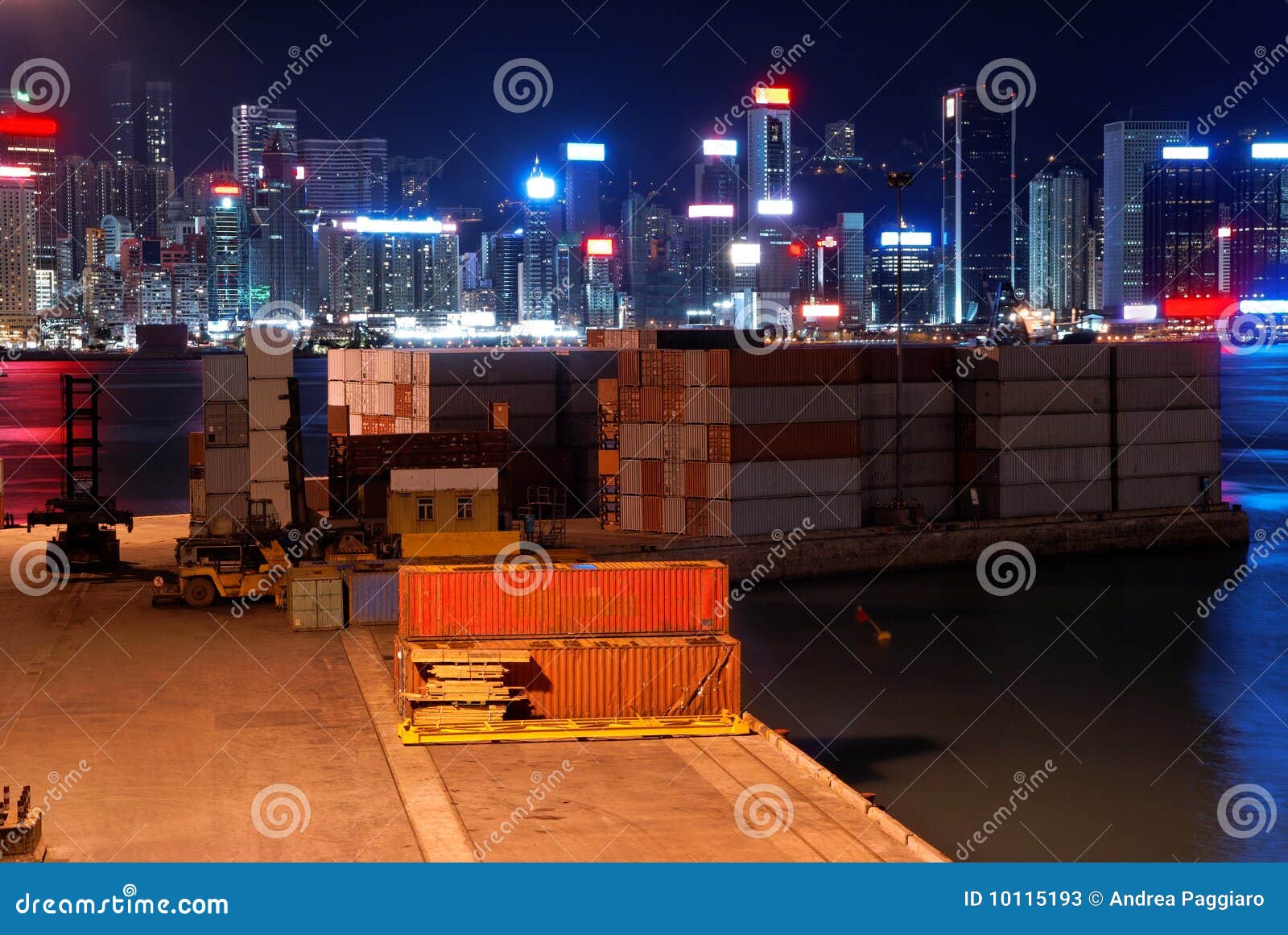 Small freight terminal in Kowloon side with view of the skyline of 