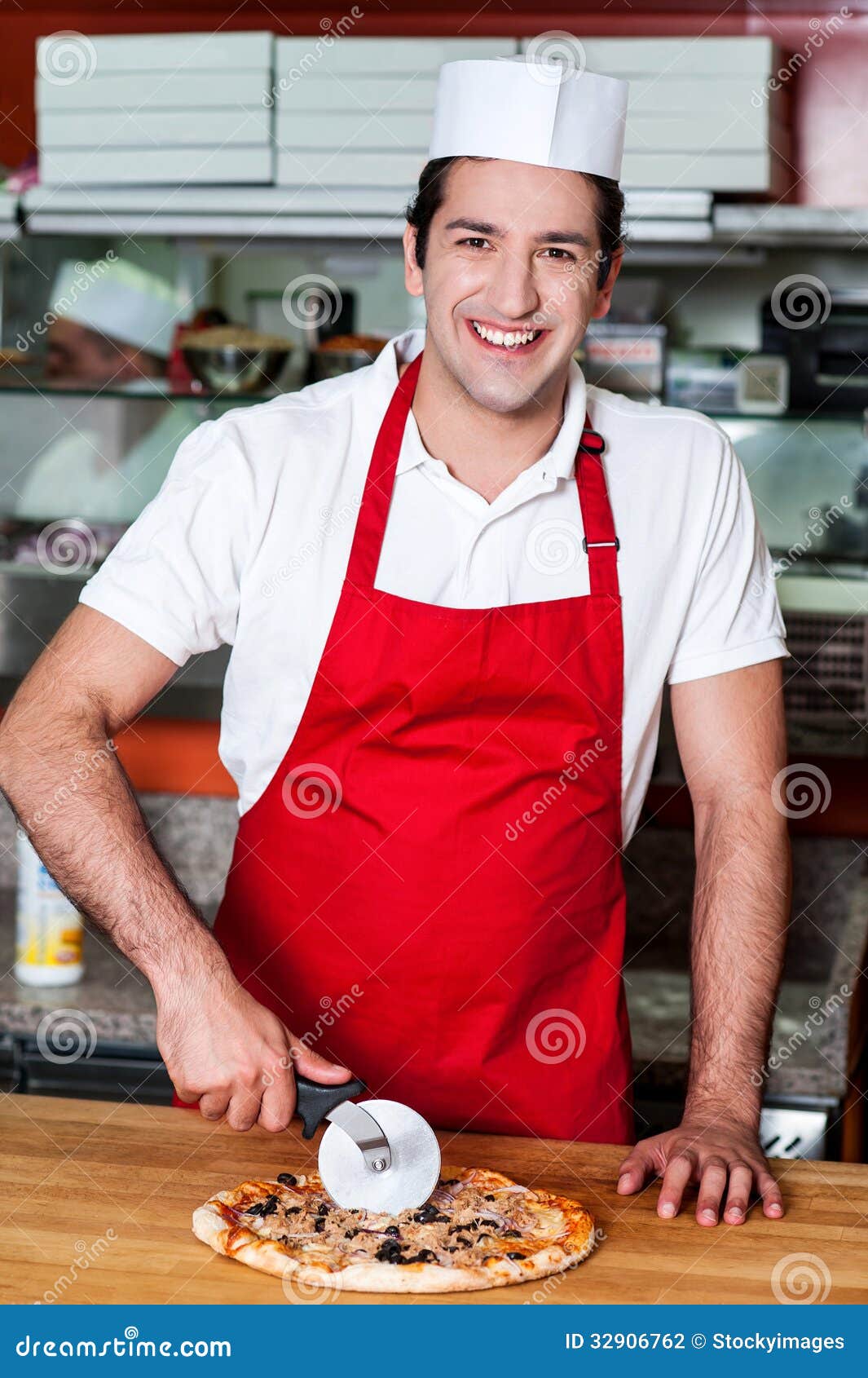 [Image: smiling-chef-cutting-pizza-cutter-young-...906762.jpg]