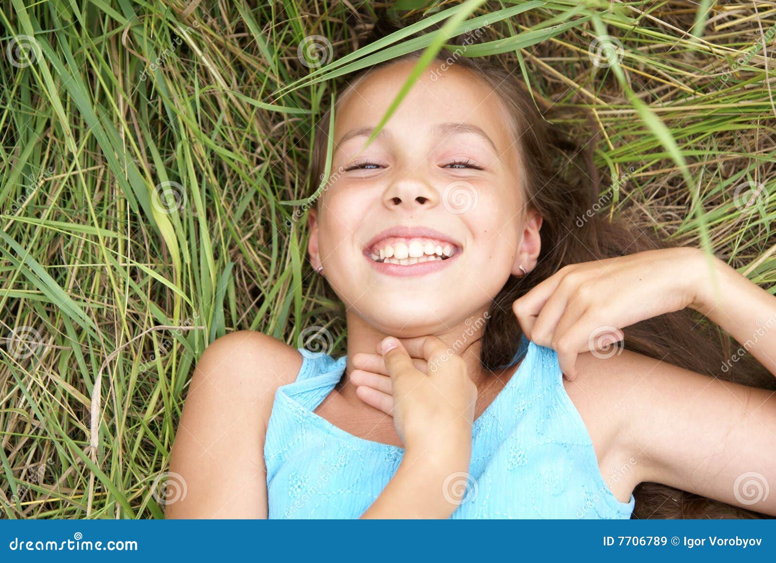 Preteen Girl In Green Grass Royalty Free Stock Photo 