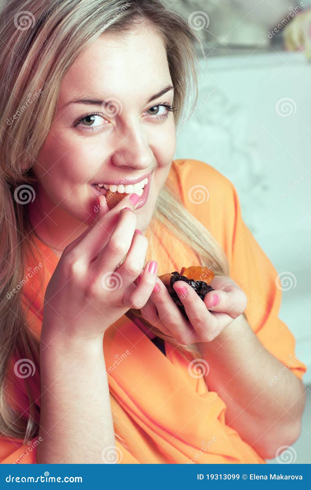 Smiling pretty young girl with dried fruits - smiling-pretty-young-girl-dried-fruits-19313099