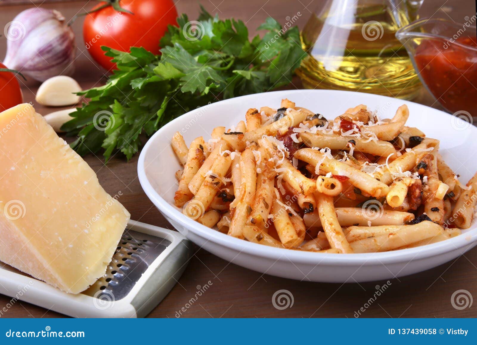 Spicy Pasta Penne Bolognese With Vegetables Chili And Cheese In Tomato