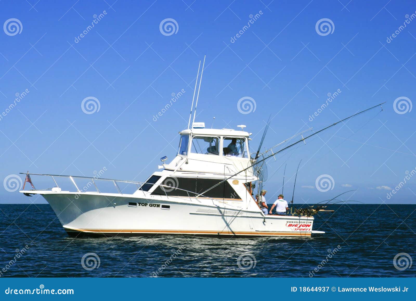 Fishermen on a charter fishing boat, Top Gun, looking for salmon and 