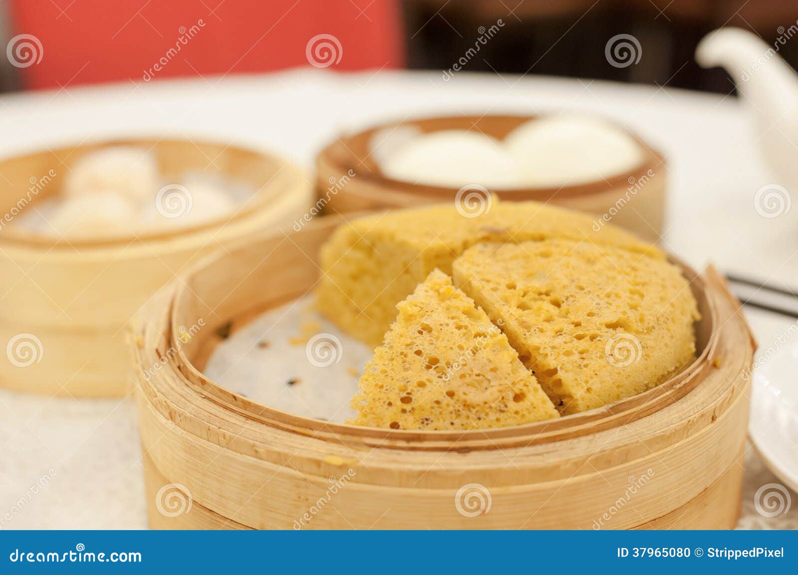 http://thumbs.dreamstime.com/z/steamed-sponge-cake-served-hong-kong-dim-sum-restaurant-ma-lai-gao-also-known-as-malay-popular-dessert-dish-37965080.jpg