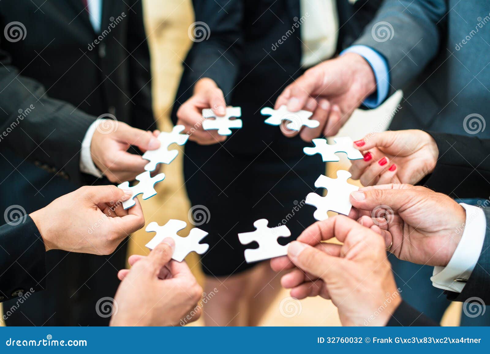 teamwork-business-people-solving-puzzle-