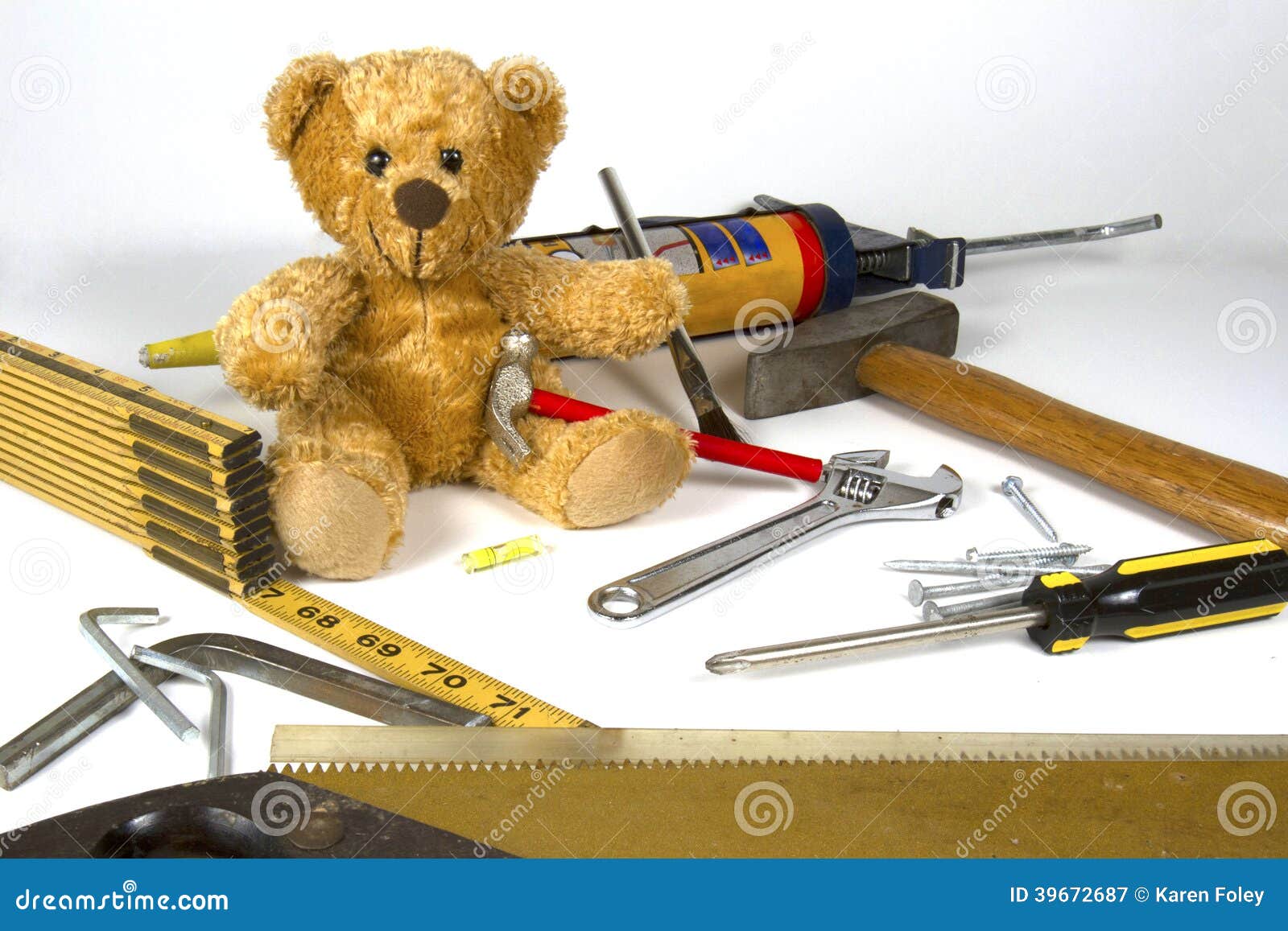 teddy-bear-repairman-sitting-amid-home-repair-maintenance-construction-tools-39672687.jpg