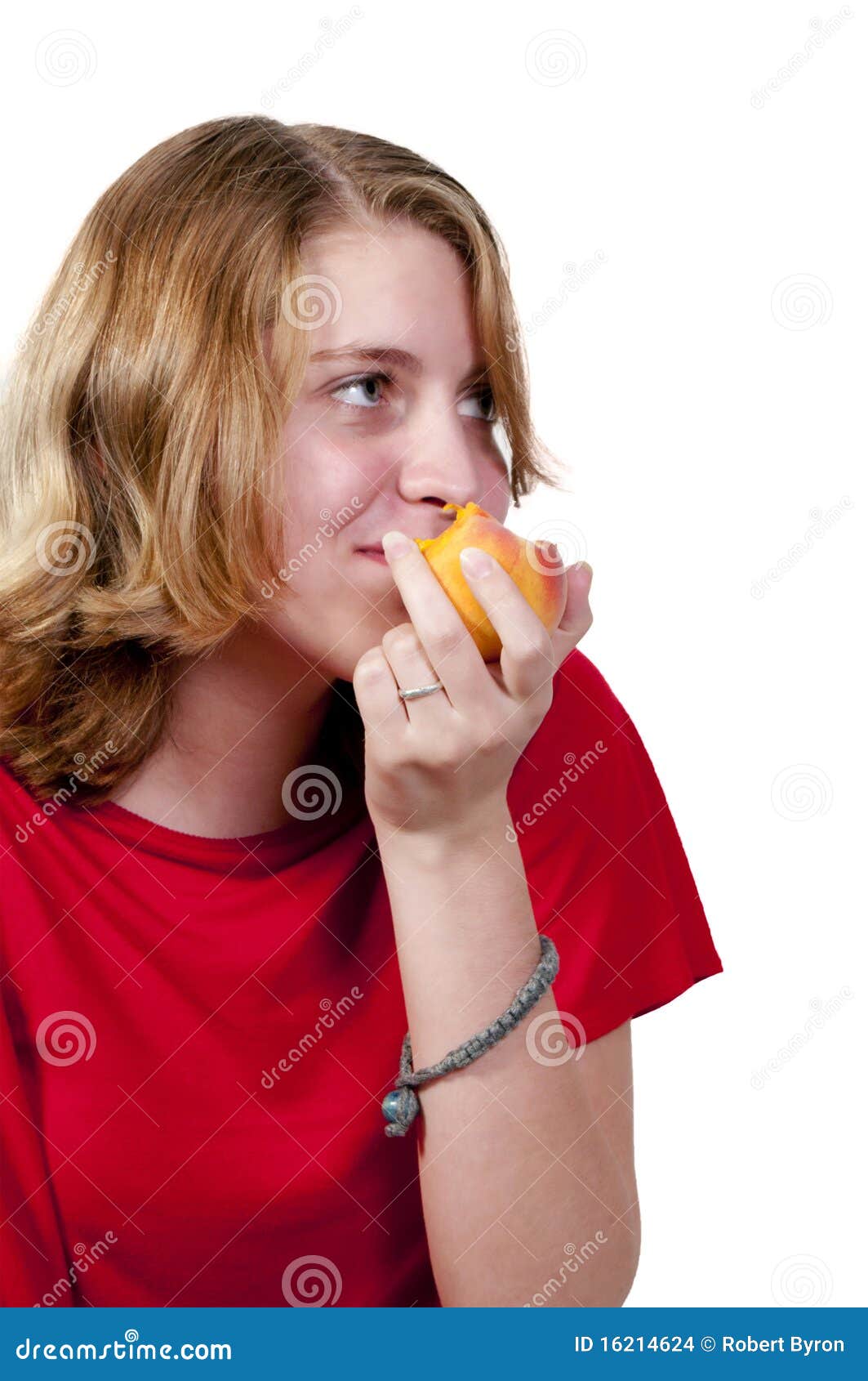 Teenage Girl Eating A Peach