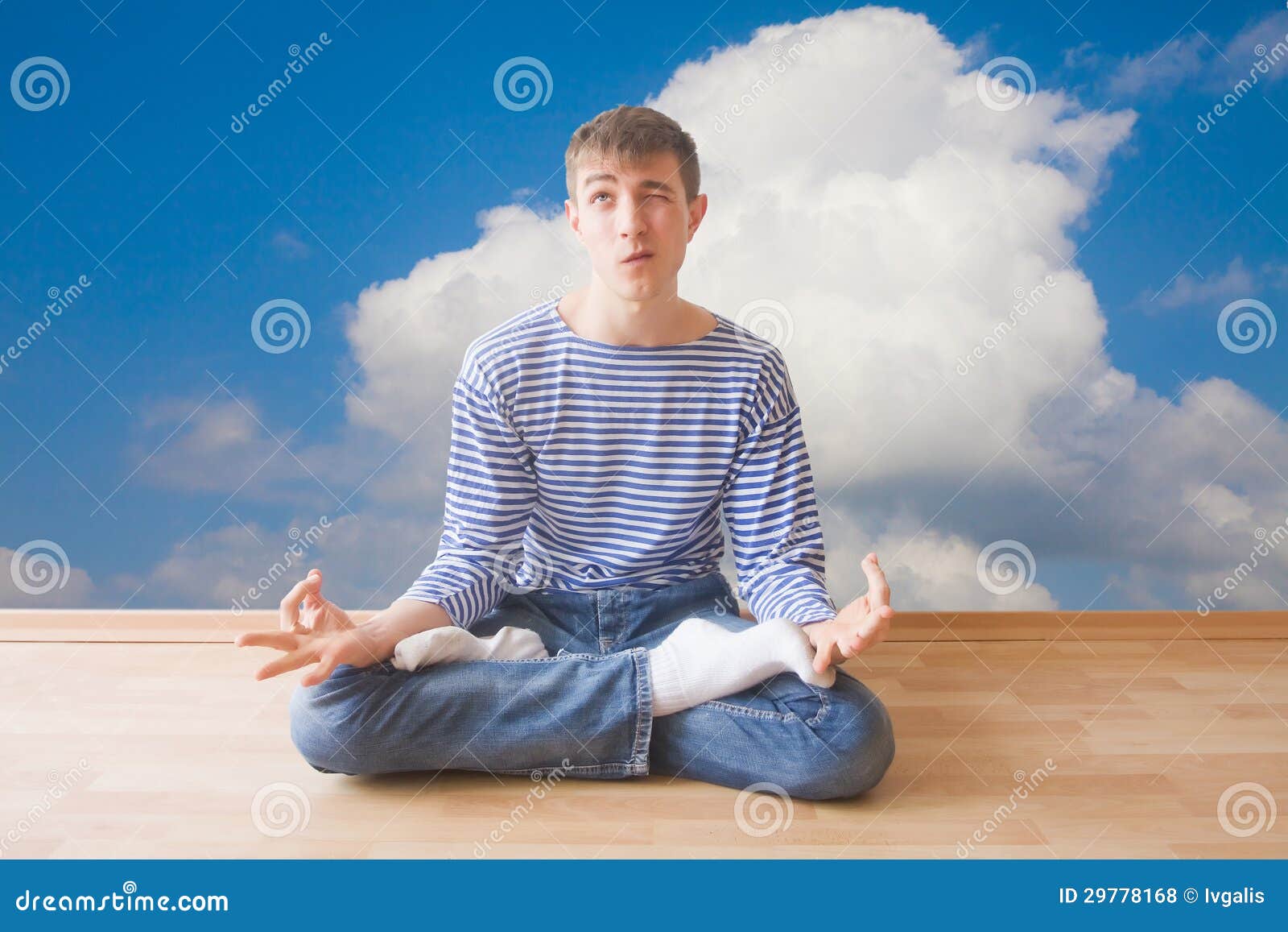 ... Stock Photos: Teenager making funny face while sitting in lotus pose