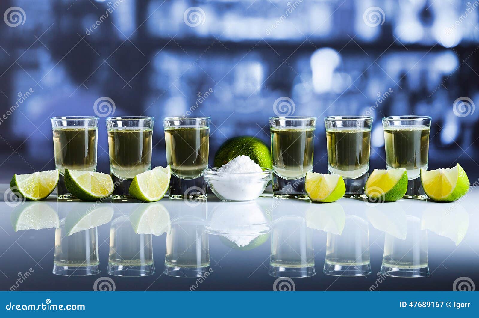 Tequila Lime And Salt On White Reflexive Table In Bar