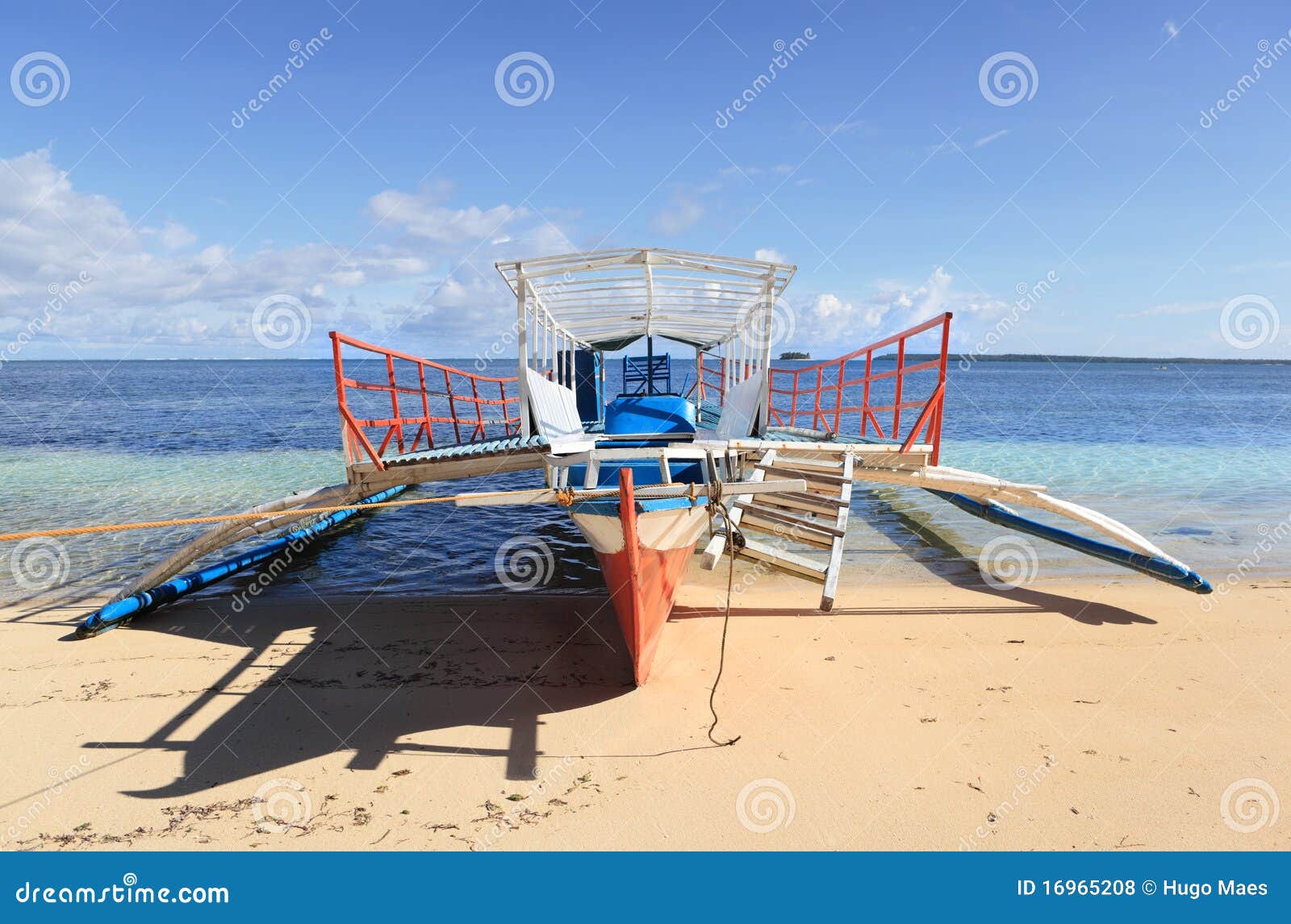 typical local bangka outrigger vessel or boat as used for passenger 