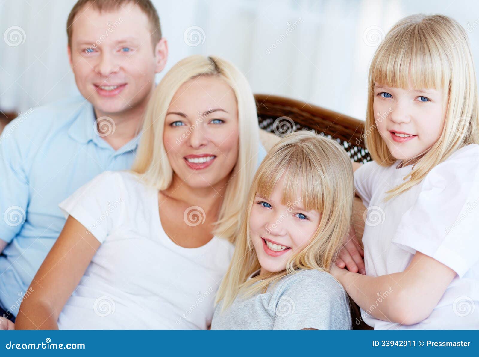 Twins And Their Parents Stock Im image