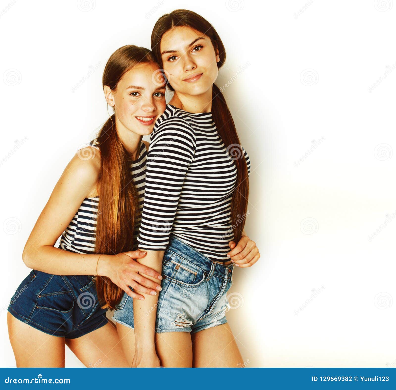 Two Cute Teenagers Having Fun Together Isolated On White Stock Photo Image Of Girls Long