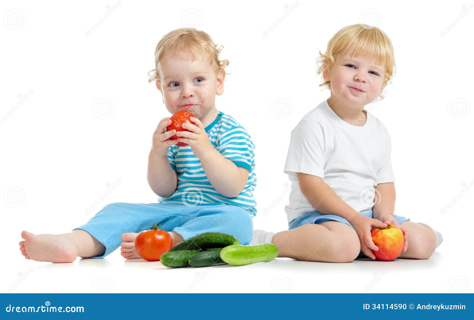 Two Happy Kids Eating Healthy Food Fruits And Vegetables Stock Photo ...