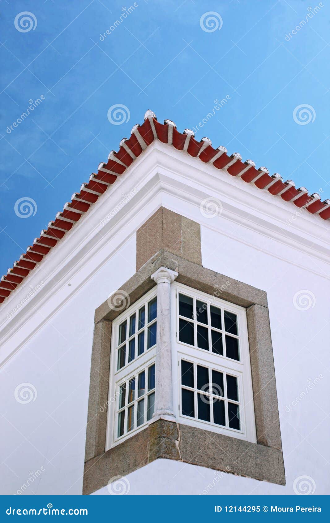 Typical corner white window in a old building.