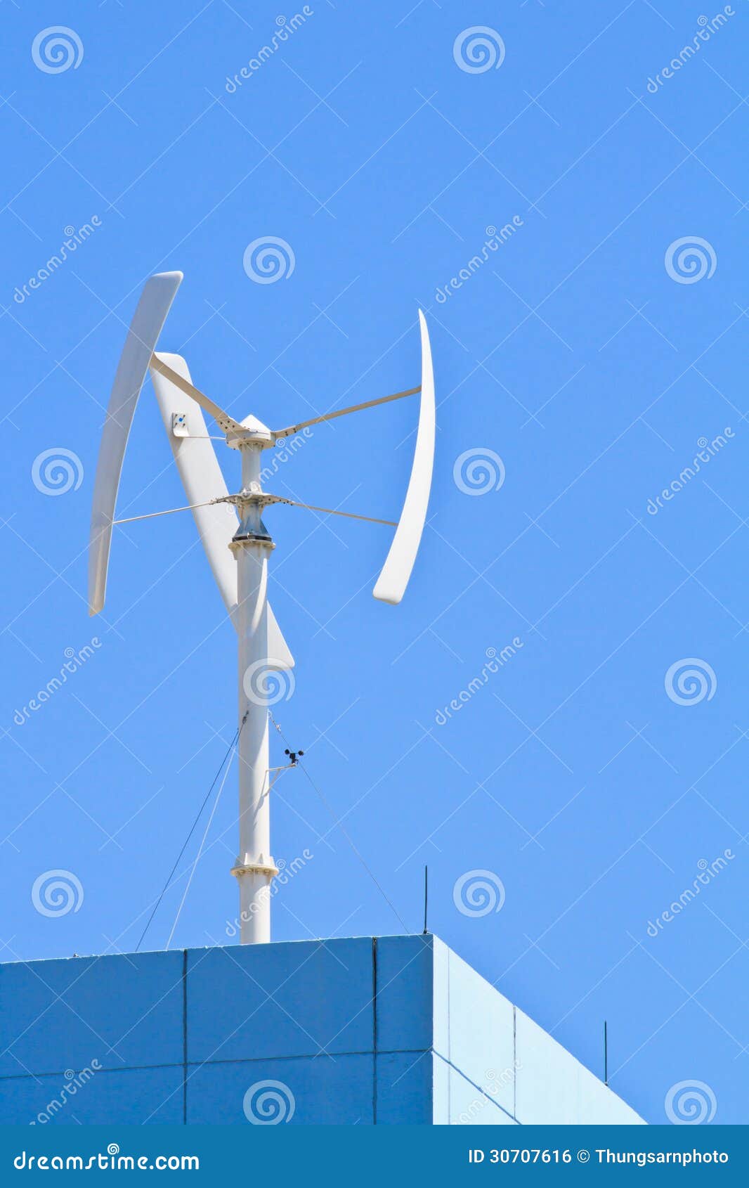 Vertical Wind Turbine On The Top Of Building Royalty Free Stock Image 