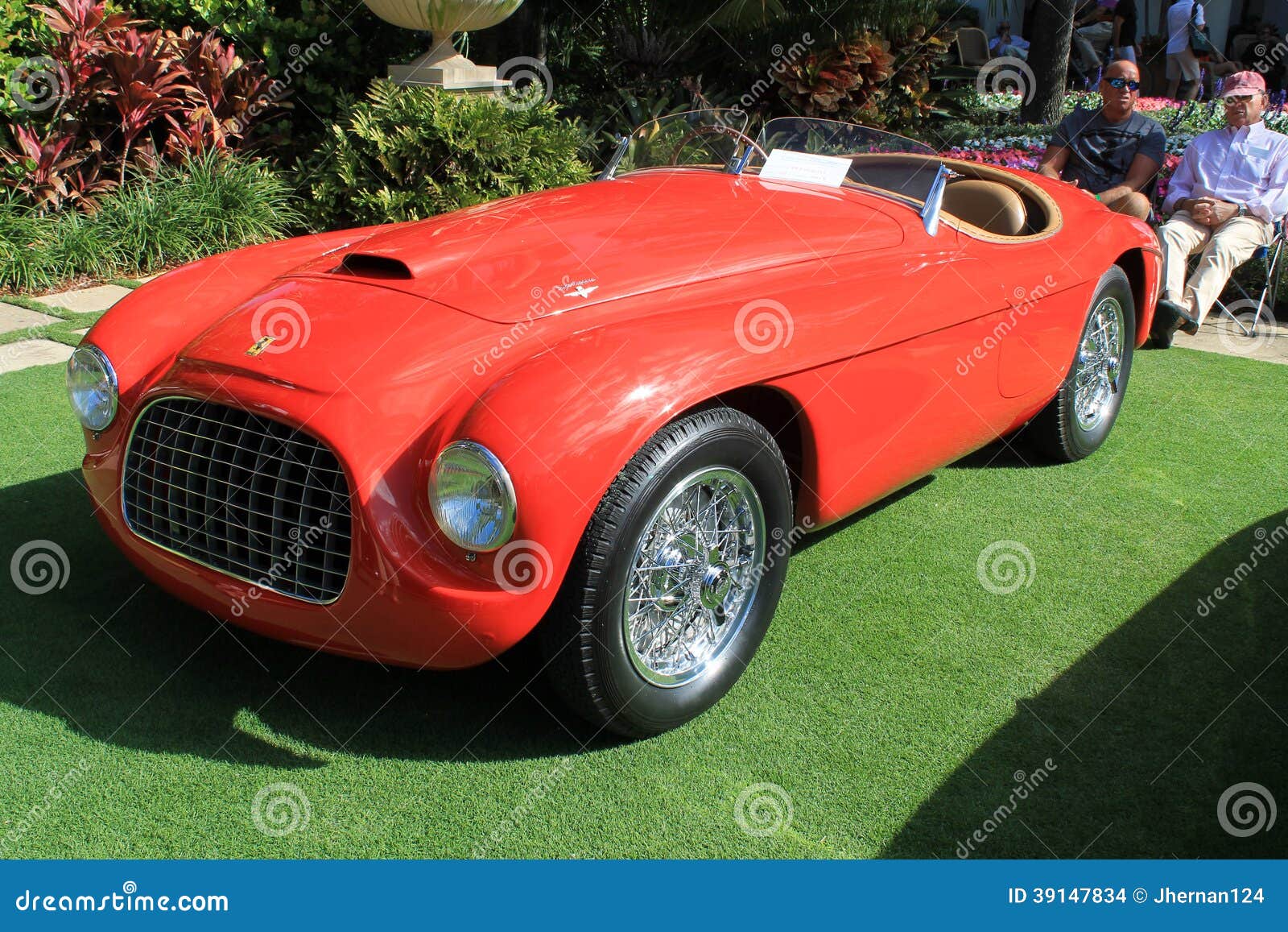 Vintage sports car showing frontend headlamps and grille. 1949 ferrari 