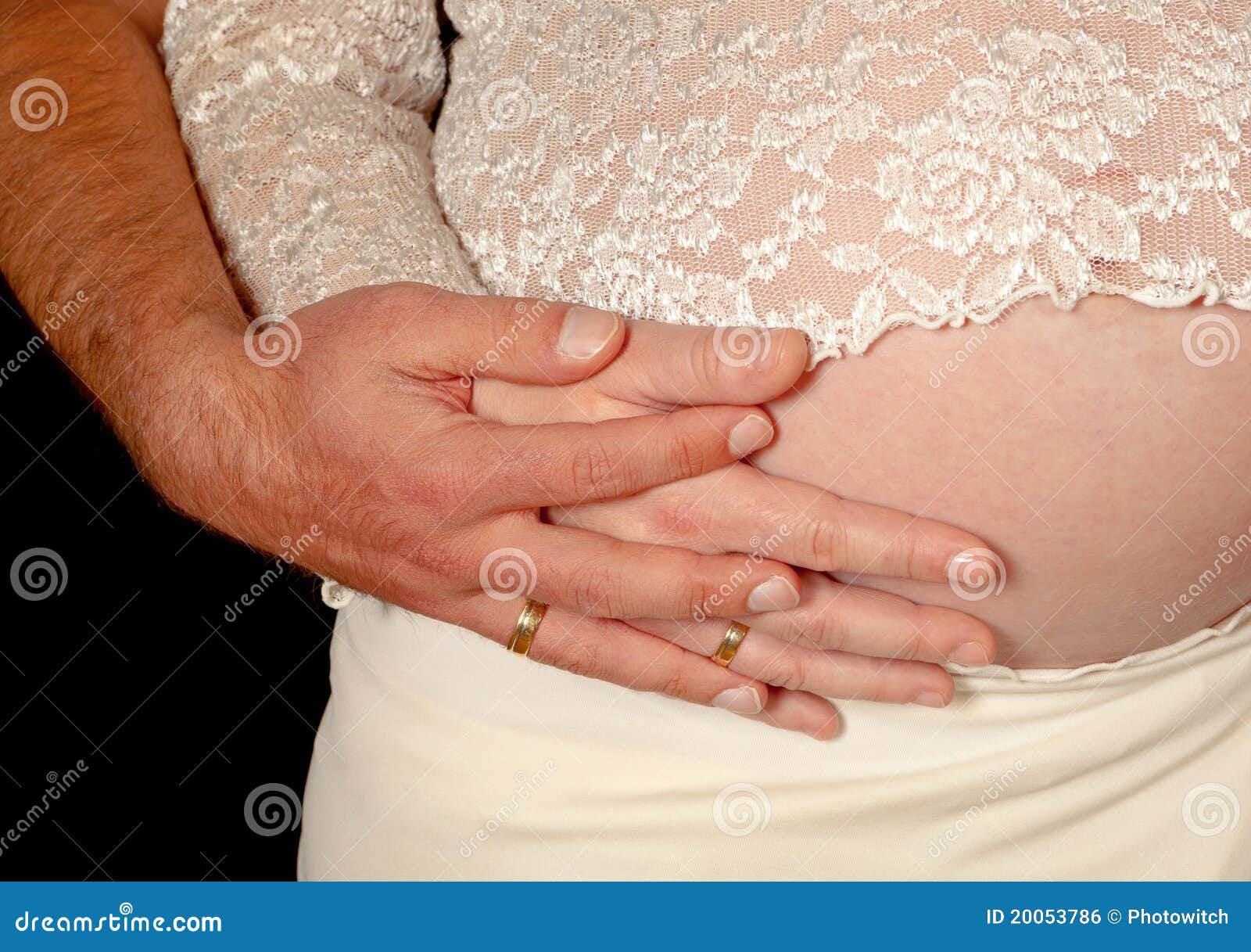 Wedding ring over belly